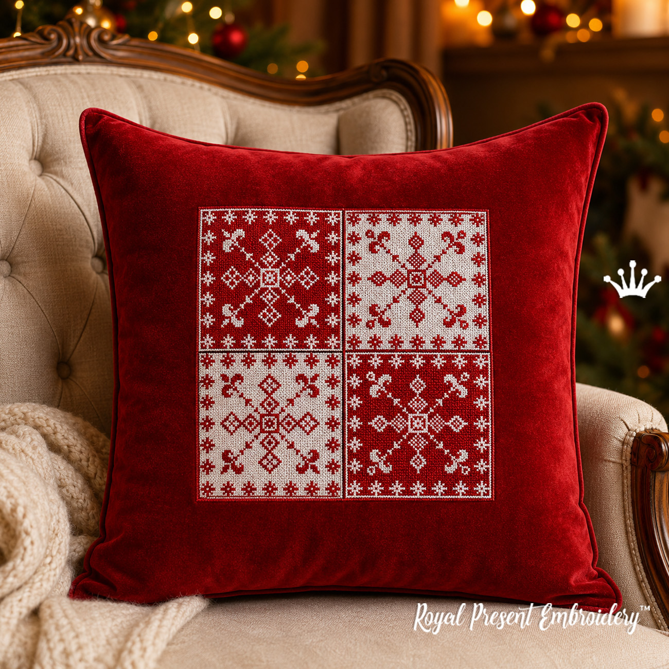 Two red and white Scandinavian snowflake machine embroidery blocks